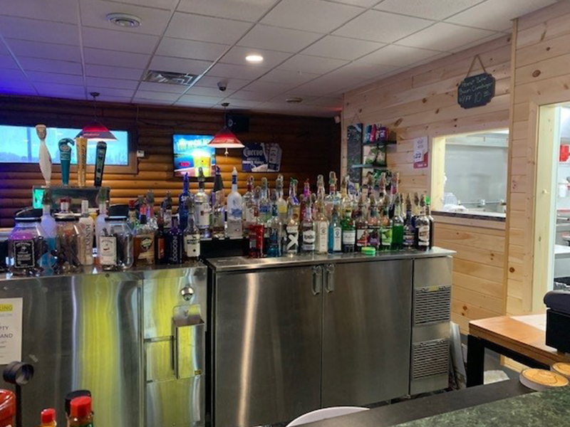 the bar with liquor and coolers at The Pond in Blackduck Minnesota